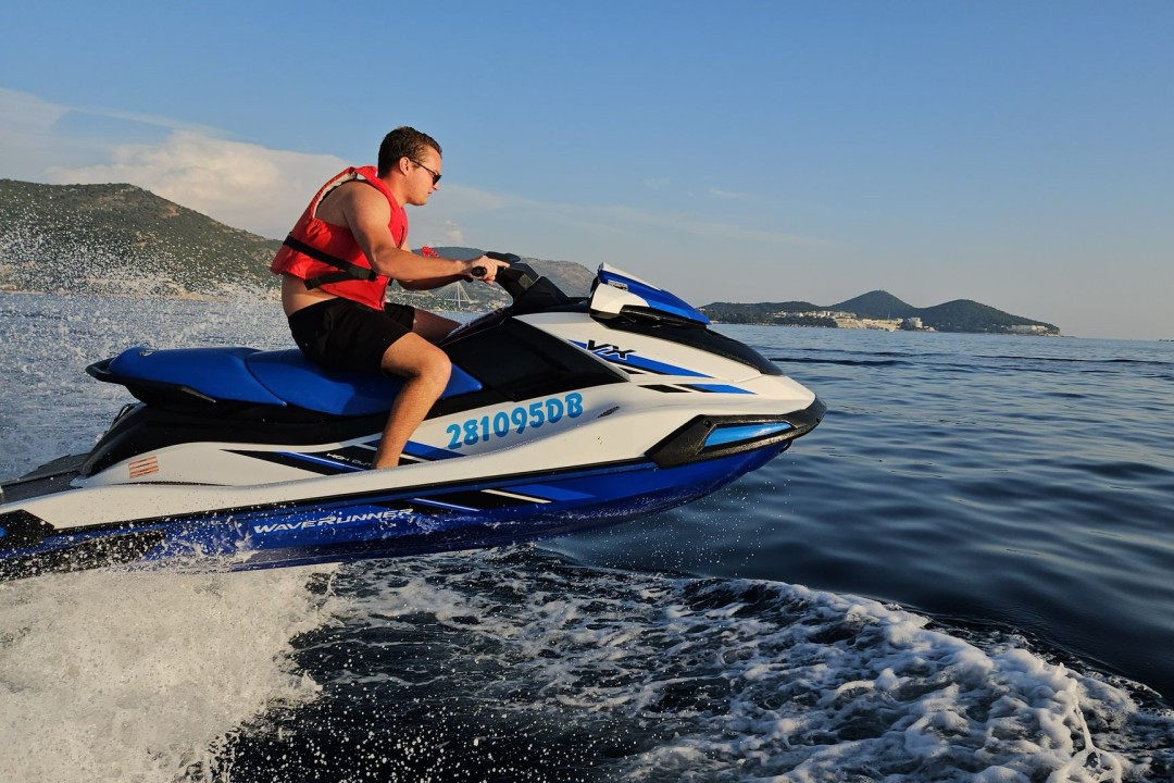 Jet ski crushing the waves by Dubrovnik